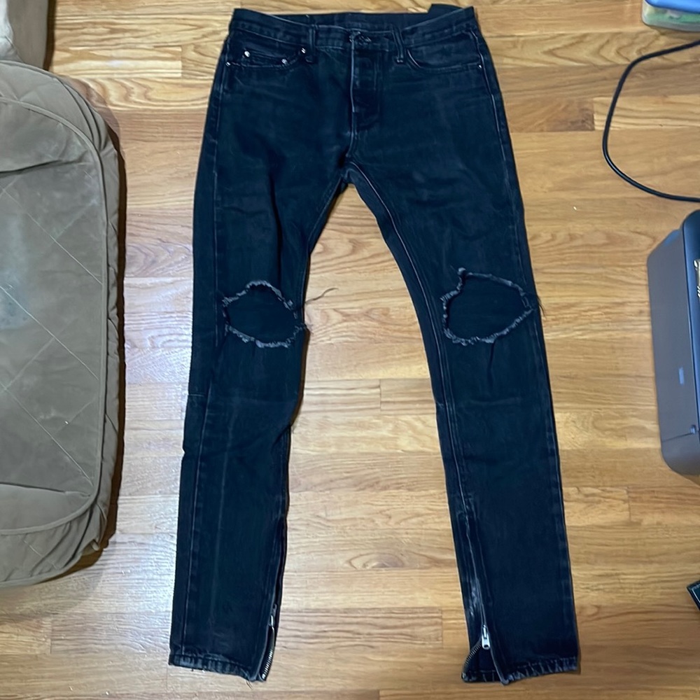 Black ripped jeans from MNML